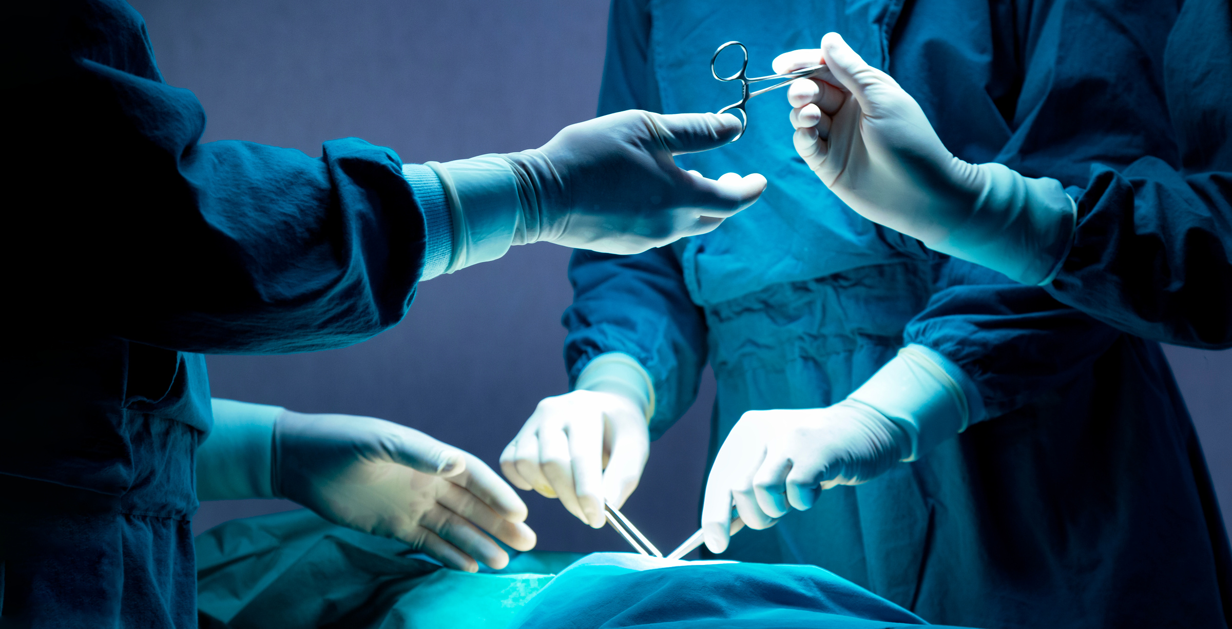 Surgeons Operating a Patient in the Operating Room